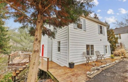 The cottage features authentic Mid-Century Modern furnishings.